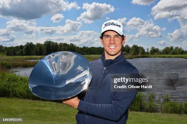 Matteo Manassero of Italy poses with the trophy after winning the tournament following the final round of the Copenhagen Challenge presented by Ejner...