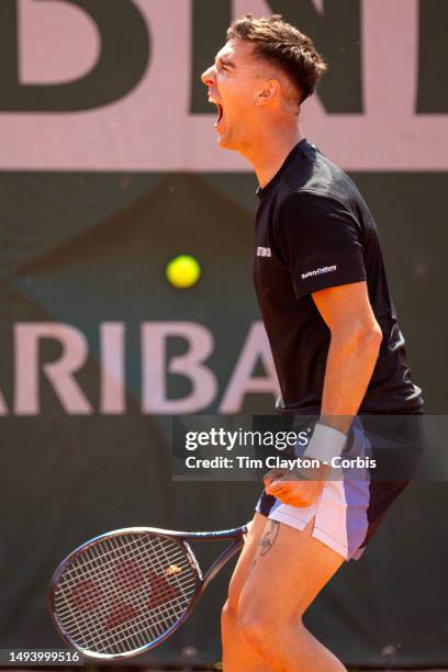 Thanasi Kokkinakis of Australia reacts to his victory against Daniel Evans of Great Britain in the first round of the singles competition on...