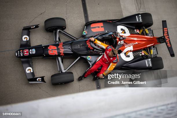 The Hy-Vee Honda of Christian Lundgaard is pulled to the grid prior to the 107th Running of the Indianapolis 500 at Indianapolis Motor Speedway on...