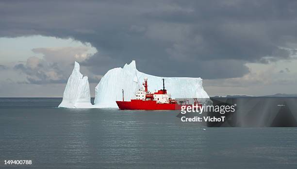 scientific ship on a mission in antarctica - antarctica boat stock pictures, royalty-free photos & images