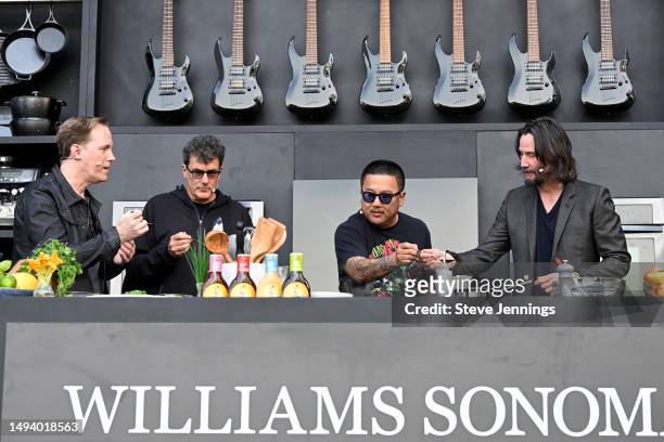 Bret Domrose, Robert Mailhouse, Chef Roy Choi and Keanu Reeves cook on the Culinary Stage on Day 2 of BottleRock Napa Valley Music Festival at Napa...