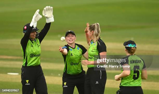 Chloe Skelton and Alex Griffiths of Western Storm celebrates the wicket of Alice Davidson-Richards of South East Stars during the Charlotte Edwards...