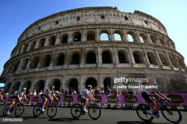 João Almeida of Portugal and UAE Team Emirates - White Best Young Rider Jersey and a general view of the peloton competing close to the The Colosseum...