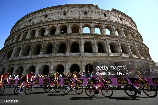 Primoz Roglič of Slovenia and Team Jumbo-Visma - Pink Leader Jersey and a general view of the peloton competing close to the The Colosseum during the...