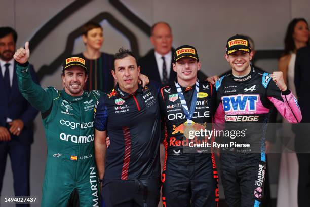 Race winner Max Verstappen of the Netherlands and Oracle Red Bull Racing , Second placed Fernando Alonso of Spain and Aston Martin F1 Team , Third...