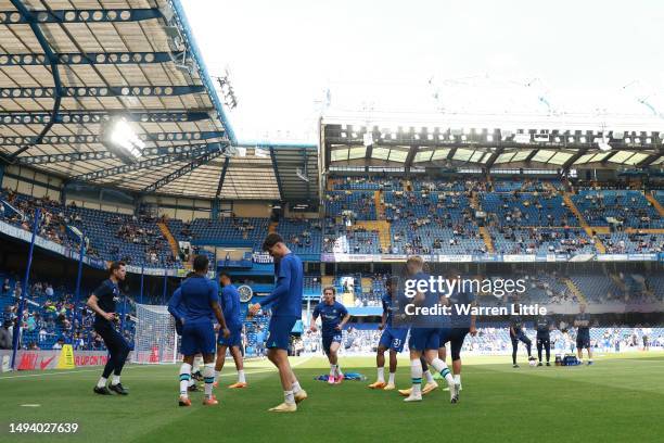 Players of Chelsea warm up prior to the Premier League match between Chelsea FC and Newcastle United at Stamford Bridge on May 28, 2023 in London,...