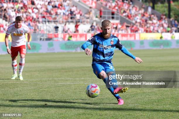 Jan-Niklas Beste of 1. FC Heidenheim 1846 scores the team's second goal from a penalty kick during the Second Bundesliga match between SSV Jahn...