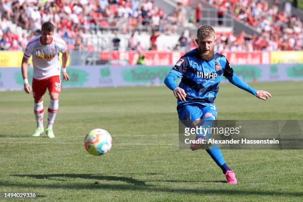Jan-Niklas Beste of 1. FC Heidenheim 1846 scores the team's second goal from a penalty kick during the Second Bundesliga match between SSV Jahn...
