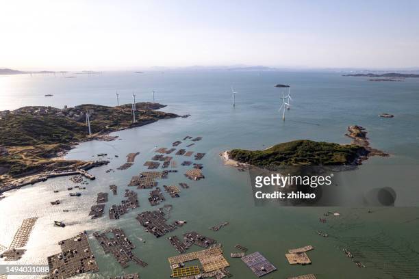 bird's eye view of the offshore fish farm - sea islands stock pictures, royalty-free photos & images