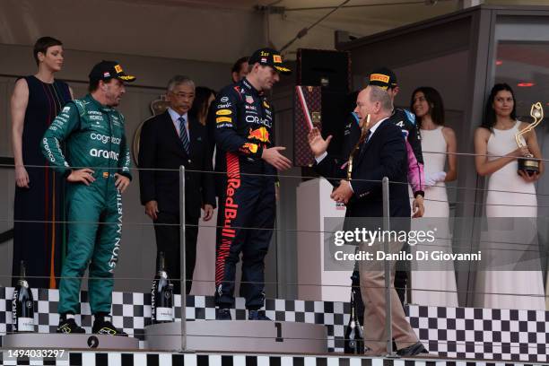 Prince Albert II of Monaco congratulates Max Verstappen of Netherlands and Red Bull Racing for the victory of the F1 Grand Prix of Monaco at Circuit...