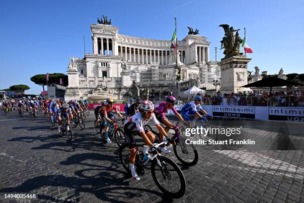 Yukiya Arashiro of Japan, Jonathan Milan of Italy and Team Bahrain - Victorious - Purple Points Jersey and a general view of the peloton competing at...