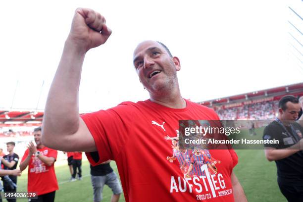 Frank Schmidt, Head Coach of 1. FC Heidenheim 1846, celebrates after the team's victory and promotion to the Bundesliga in the Second Bundesliga...