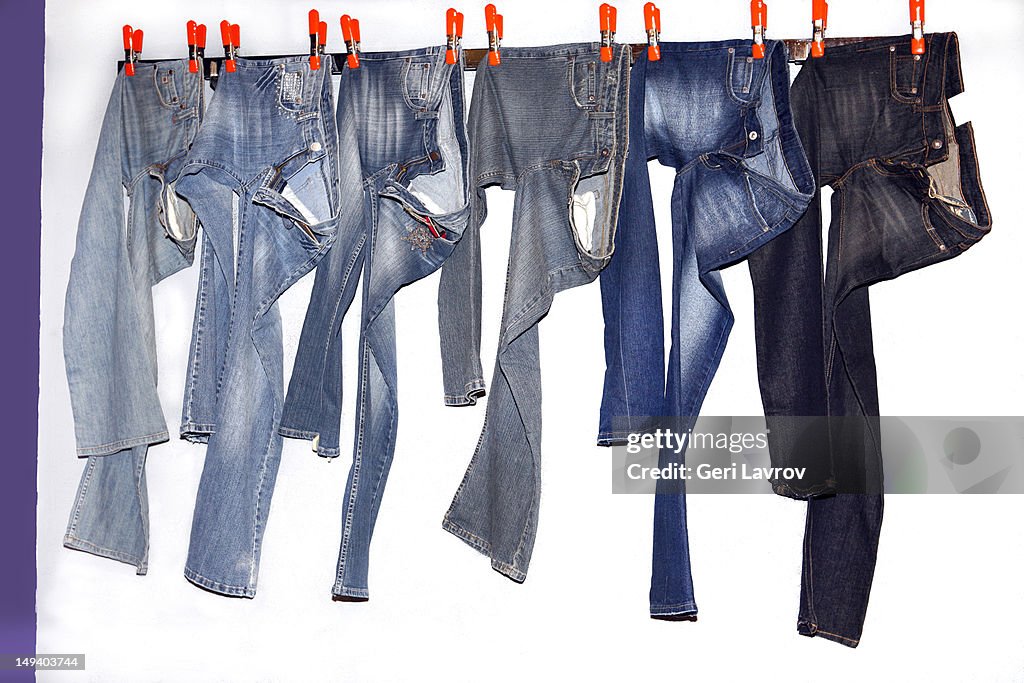 Jeans hanging on string