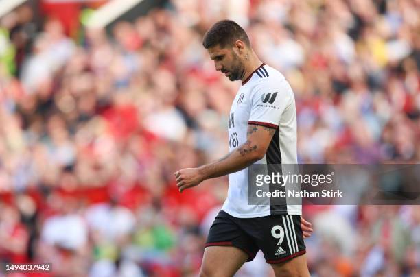 Aleksandar Mitrovic of Fulham reacts after a missed chance during the Premier League match between Manchester United and Fulham FC at Old Trafford on...