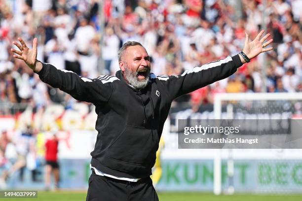 Tim Walter, Head Coach of Hamburger SV, celebrates after the team's victory, before 1. FC Heidenheim 1846 scored a last minute goal, to confirm...