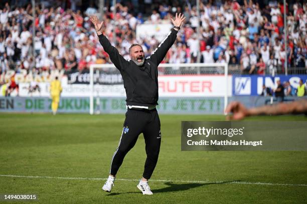 Tim Walter, Head Coach of Hamburger SV, celebrates after the team's victory, before 1. FC Heidenheim 1846 scored a last minute goal, to confirm...