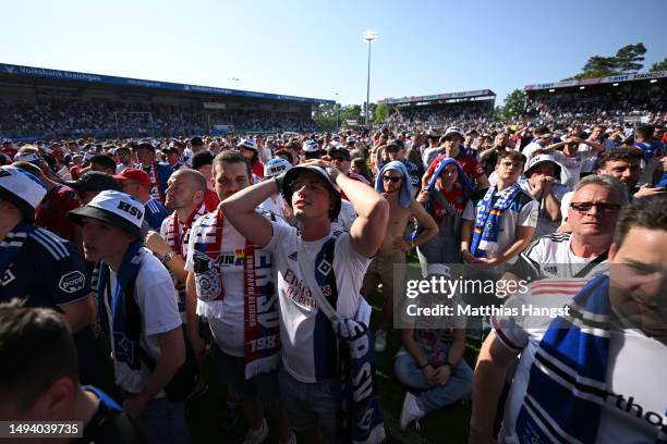 Hamburger SV fans look dejected after their side finished 3rd in the league, and will have to play a further play off game after the Second...