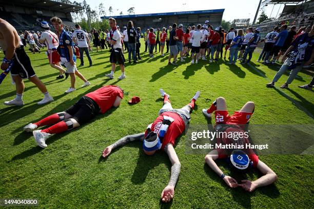 Hamburger SV fans look dejected after their side finished 3rd in the league, and will have to play a further play off game after the Second...