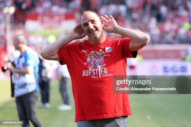 Frank Schmidt, Head Coach of 1. FC Heidenheim 1846, celebrates after the team's victory and promotion to the Bundesliga in the Second Bundesliga...