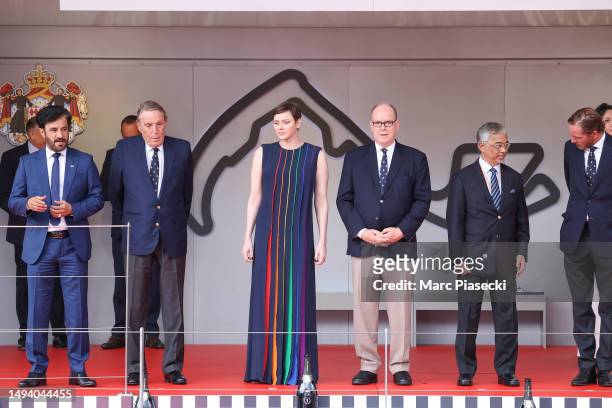 Mohammed Ben Sulayem, Guest, Princess Charlene of Monaco, Prince Albert of Monaco, Guest and Pierre Casiraghi celebrate on the podium during the F1...