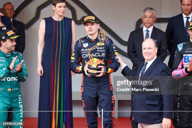 Prince Albert II of Monaco congratulates Max Verstappen of Netherlands and Red Bull Racing for the victory of the F1 Grand Prix of Monaco at Circuit...