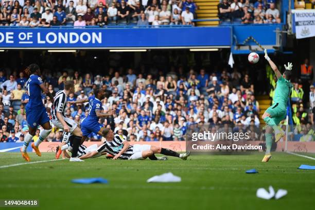 Martin Dubravka of Newcastle United makes a save from Raheem Sterling of Chelsea during the Premier League match between Chelsea FC and Newcastle...