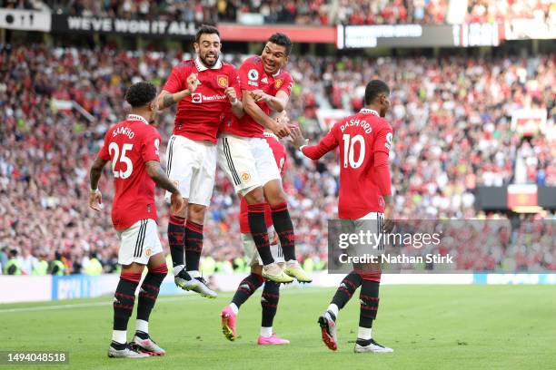 Bruno Fernandes of Manchester United celebrates with teammate Casemiro after scoring the team's second goal during the Premier League match between...