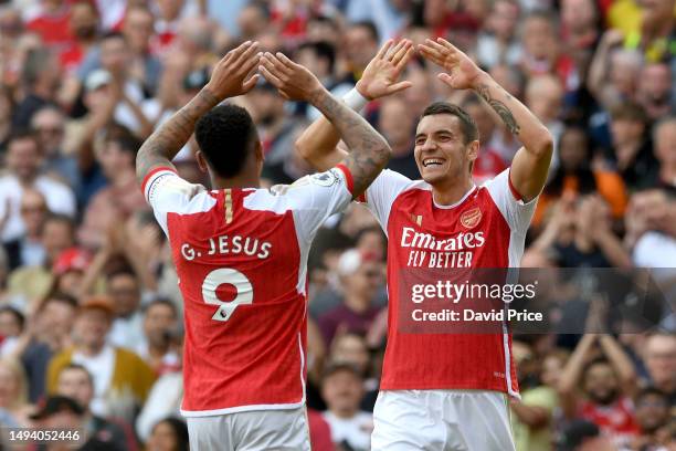 Jakub Kiwior of Arsenal celebrates with team mate Gabriel Jesus of Arsenal after scoring their sides fifth goal during the Premier League match...