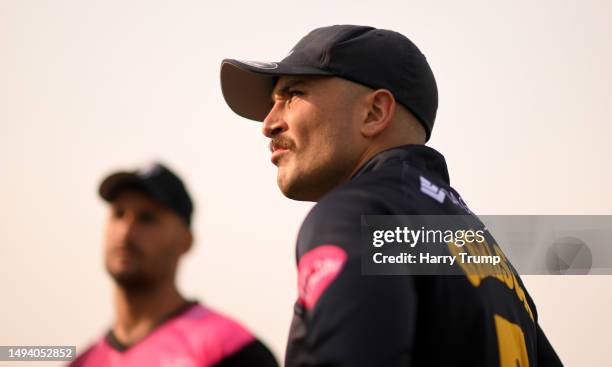 Lewis Gregory of Somerset and Kiran Carlson of Glamorgan look on ahead of the Vitality Blast T20 match between Somerset and Glamorgan at The Cooper...