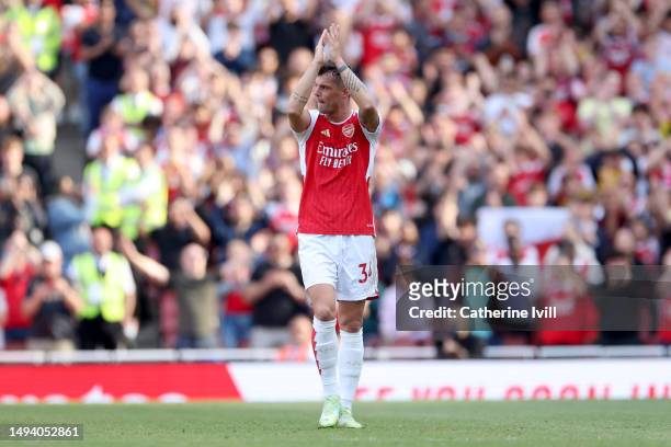 Granit Xhaka of Arsenal applauds fans after being substituted off during the Premier League match between Arsenal FC and Wolverhampton Wanderers at...