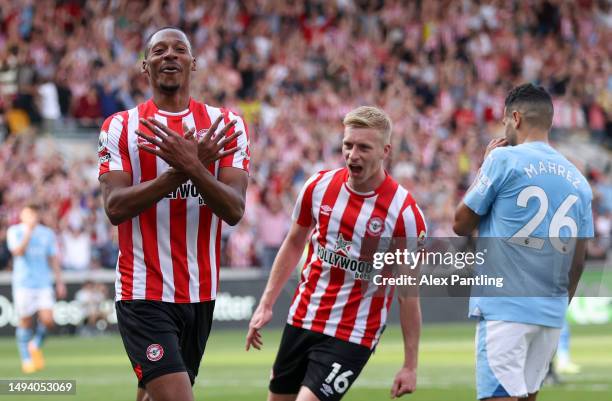 Ethan Pinnock of Brentford celebrates after scoring their sides first goal during the Premier League match between Brentford FC and Manchester City...