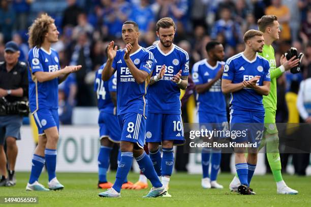 Youri Tielemans and James Maddison of Leicester City look dejected after their sides defeat, resulting in their relegation to the Championship during...