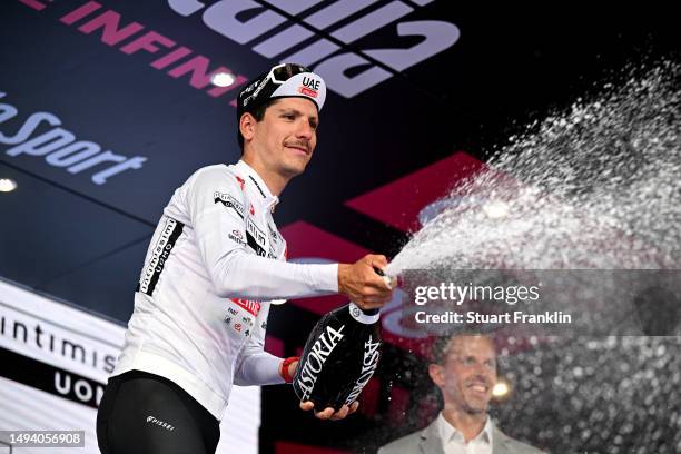 João Almeida of Portugal and UAE Team Emirates - White Best Young Rider Jersey celebrates at podium during the 106th Giro d'Italia 2023, Stage 21 a...