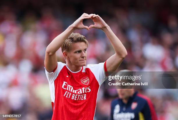 Martin Odegaard of Arsenal acknowledges fans after the Premier League match between Arsenal FC and Wolverhampton Wanderers at Emirates Stadium on May...