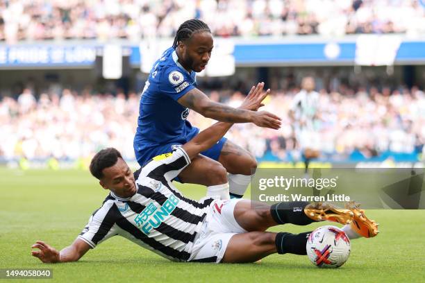 Raheem Sterling of Chelsea is challenged by Jacob Murphy of Newcastle United during the Premier League match between Chelsea FC and Newcastle United...