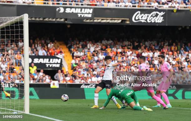 Diego Lopez of Valencia CF scores the team's first goal during the LaLiga Santander match between Valencia CF and RCD Espanyol at Estadio Mestalla on...