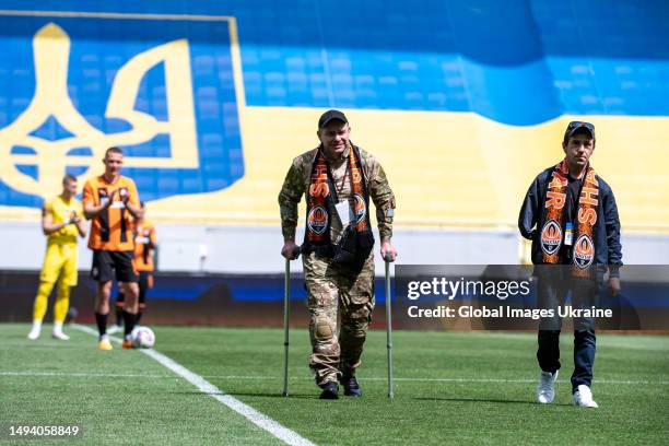 Veterans of the Russo-Ukrainian war Maksym Ushenko and Maksym Binkovsky in the field before the start of the match on May 28, 2023 in Lviv, Ukraine....