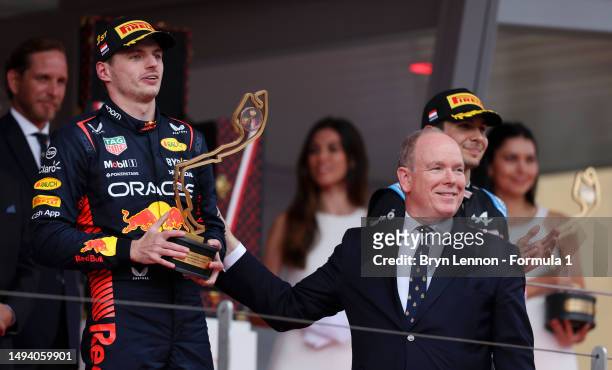 Race winner, Max Verstappen of the Netherlands and Oracle Red Bull Racing is presented with his trophy by Prince Albert of Monaco on the podium...