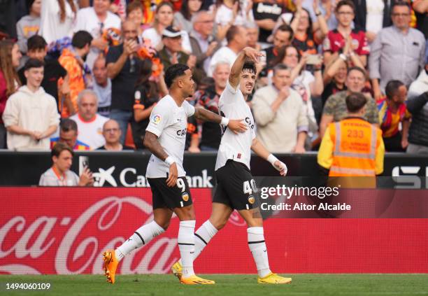 Diego Lopez of Valencia CF celebrates after scoring the team's first goal during the LaLiga Santander match between Valencia CF and RCD Espanyol at...