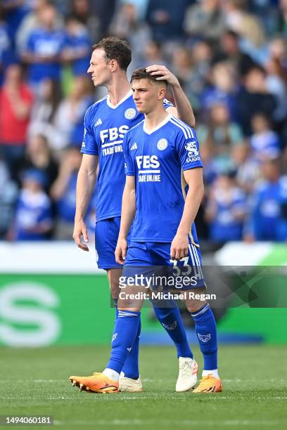 Jonny Evans and Luke Thomas of Leicester City look dejected after their sides defeat, resulting in their relegation to the Championship during the...