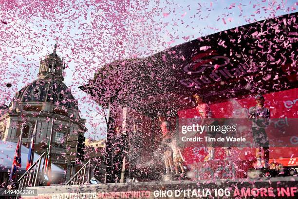 Geraint Thomas of The United Kingdom and Team INEOS Grenadiers on second place, race winner Primoz Roglič of Slovenia and Team Jumbo-Visma - Pink...