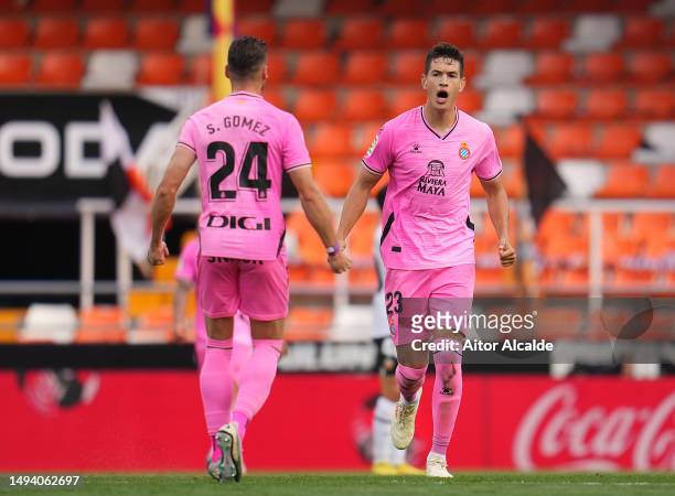 Cesar Montes of RCD Espanyol celebrates with teammate Sergi Gomez after scoring the team's first goal during the LaLiga Santander match between...