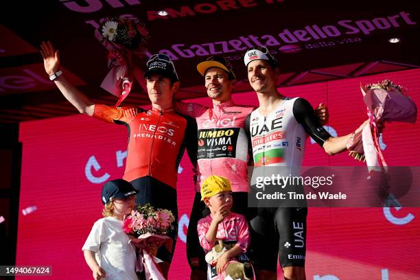 Geraint Thomas of The United Kingdom and Team INEOS Grenadiers on second place, race winner Primoz Roglič of Slovenia and Team Jumbo-Visma - Pink...