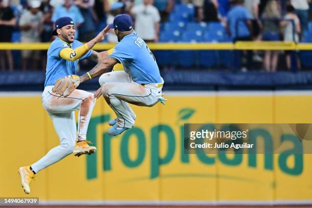 Jose Siri and Wander Franco of the Tampa Bay Rays celebrate after defeating the Los Angeles Dodgers 11-1 at Tropicana Field on May 28, 2023 in St...