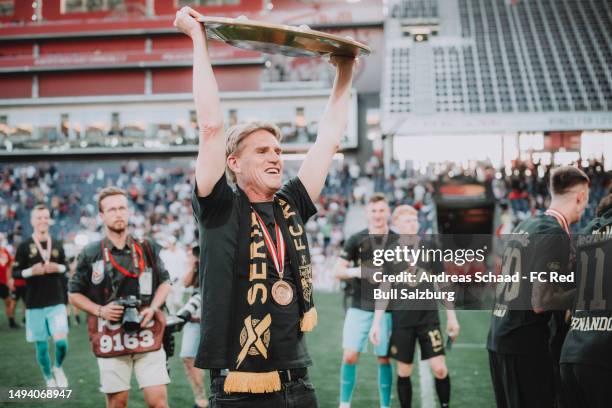 Sporing director Christoph Freund of FC Red Bull Salzburg celebrates winning the Austrian championship trophy after the Admiral Bundesliga match...