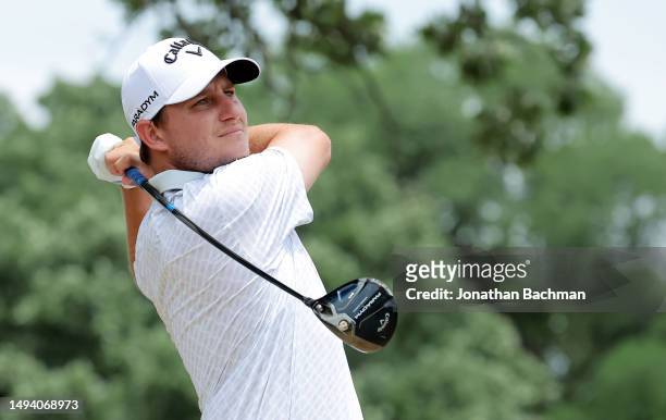 Emiliano Grillo of Argentina hits his first shot on the 3rd hole during the final round of the Charles Schwab Challenge at Colonial Country Club on...