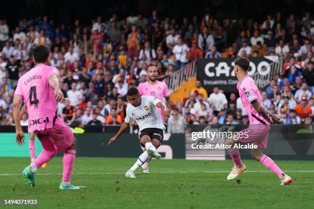 Lino of Valencia CF scores the team's second goal during the LaLiga Santander match between Valencia CF and RCD Espanyol at Estadio Mestalla on May...