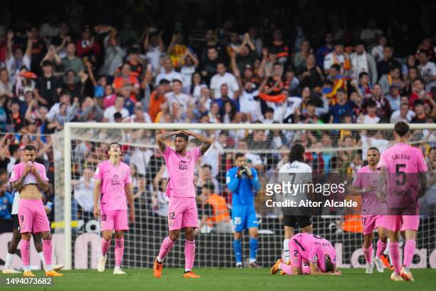 Vinicius Souza of RCD Espanyol looks dejected after the team's loss and subsequent demotion during the LaLiga Santander match between Valencia CF and...