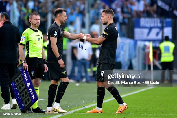 Stefan Radu and Ciro Immobile of SS Lazio hands over the captain's armband during the Serie A match between SS Lazio and US Cremonese at Stadio...