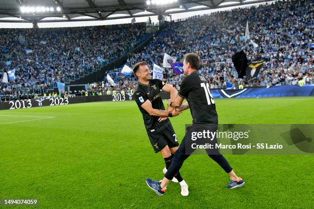 Stefan Radu and Senad Lulic former of SS Lazio celebrates a victory after the Serie A match between SS Lazio and US Cremonese at Stadio Olimpico on...